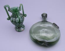 An unusual green glass perfume flask and a small antique millefiori two handled vase.