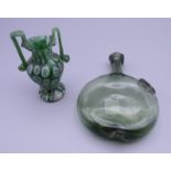 An unusual green glass perfume flask and a small antique millefiori two handled vase.