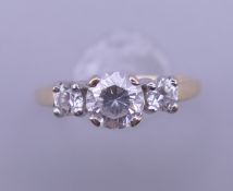A 14 ct gold cubic zirconia ring. Ring size M. 2.5 grammes total weight.