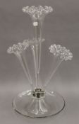 A clear glass epergne. 50 cm high.