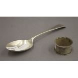 A silver spoon and a silver napkin ring. 3.2 troy ounces.