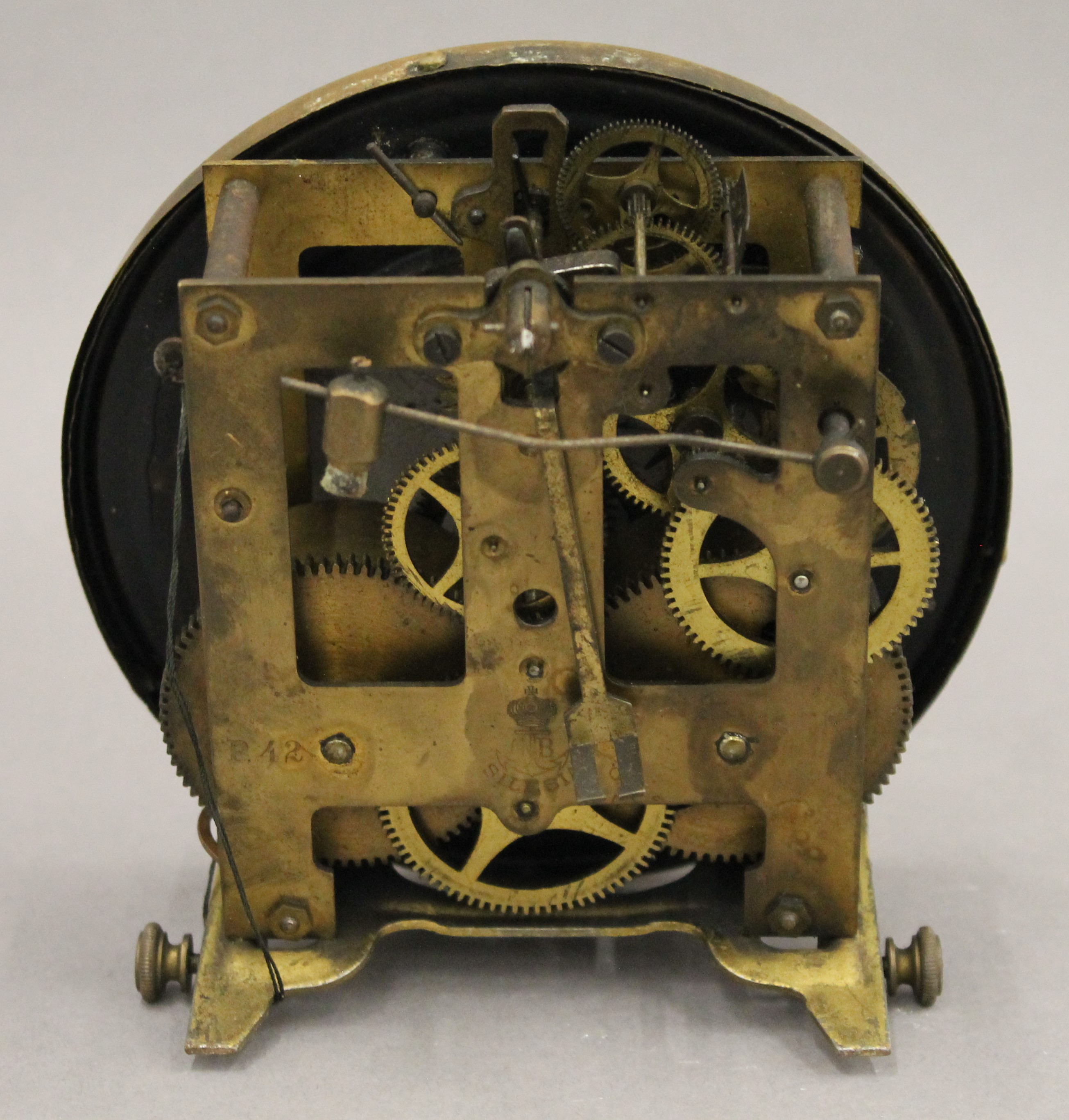 A clock movement and pendulum. 14.5 cm diameter. - Image 3 of 5