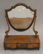 A 19th century mahogany three drawer toilet mirror. 44 cm wide.