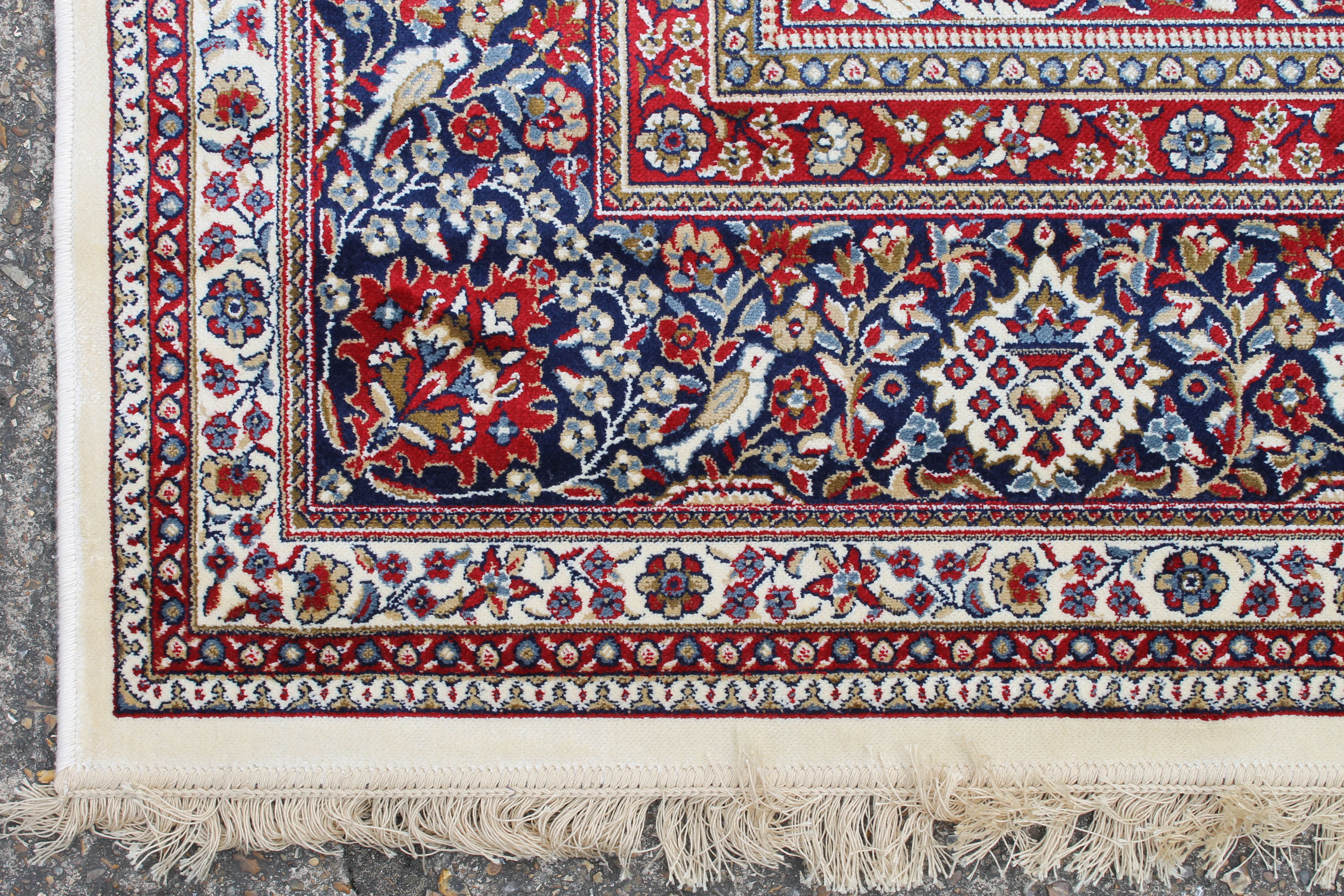 An ivory ground full pile Kashmir traditional medallion rug. 330 x 240 cm. - Image 2 of 3