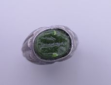 A seal top ring. Ring size U/V.