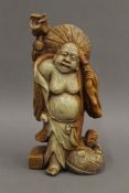 A soapstone model of Buddha. 18 cm high.