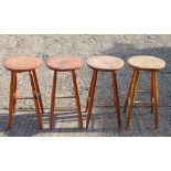 Four vintage stools.
