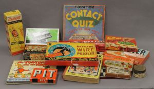 A box of vintage games and toys