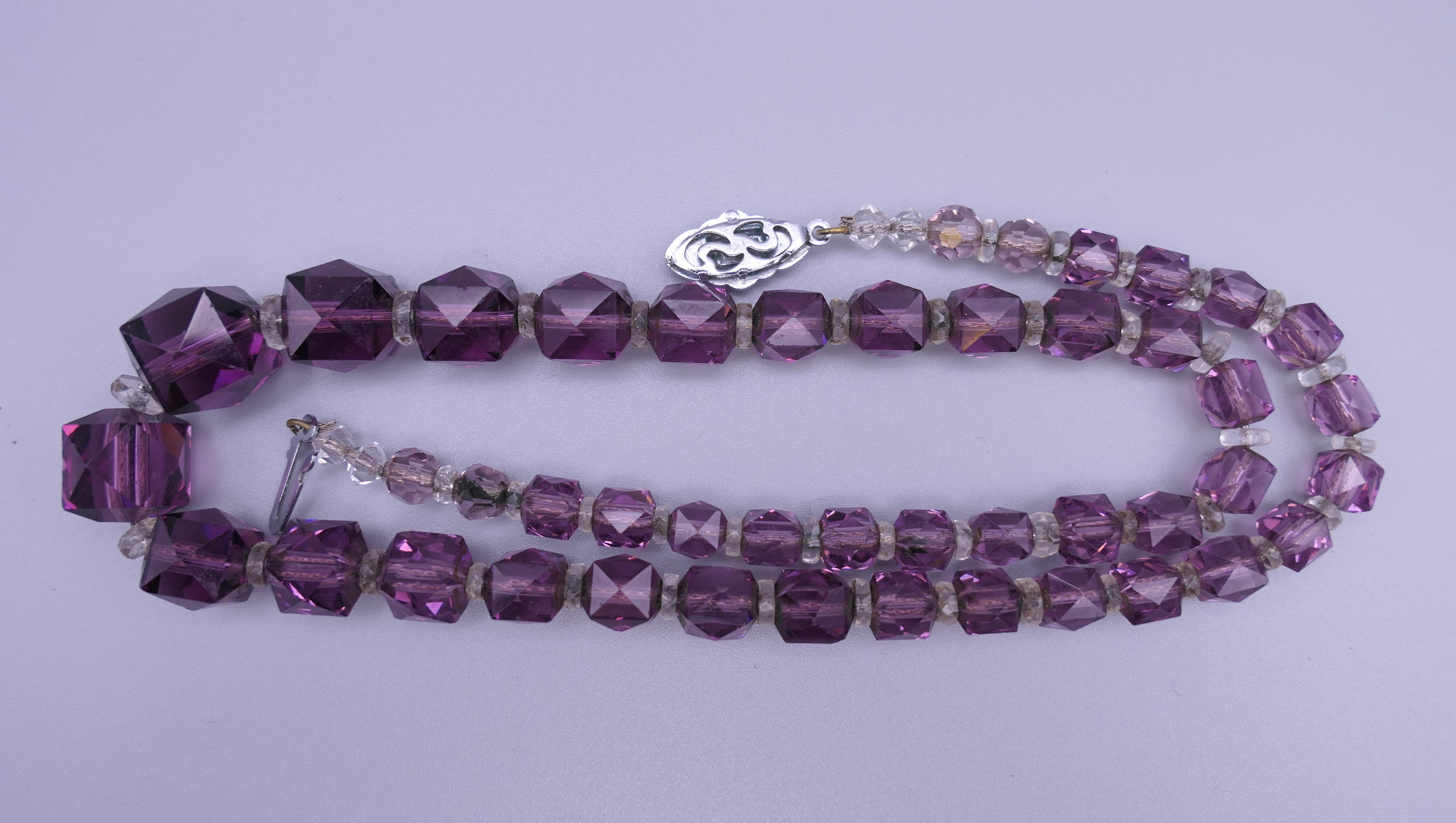 An amethyst set gold ring, together with a dress necklace and a pair of clip on earrings. - Image 12 of 13