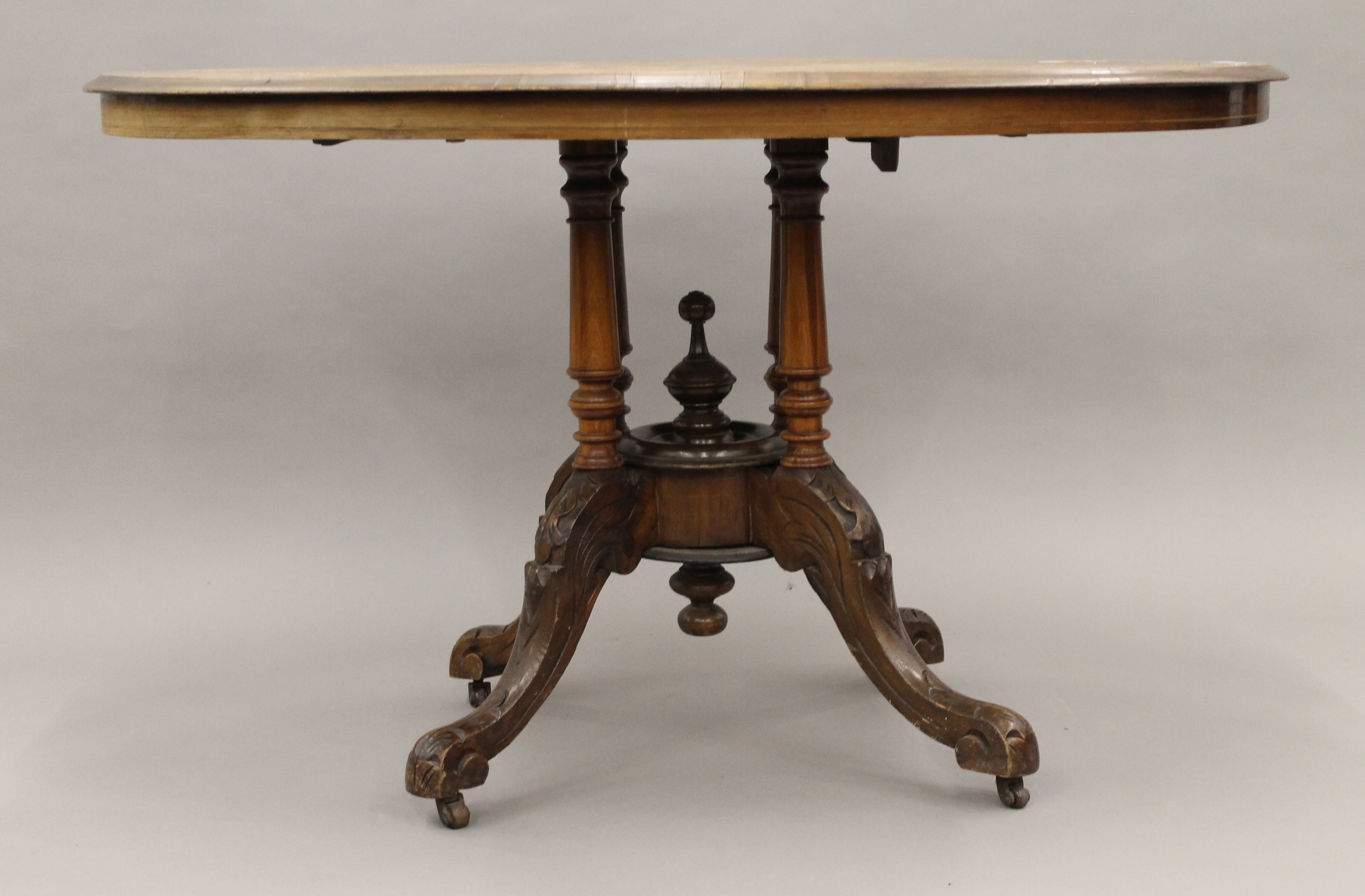 A Victorian walnut loo table. 117 cm long. - Image 3 of 6