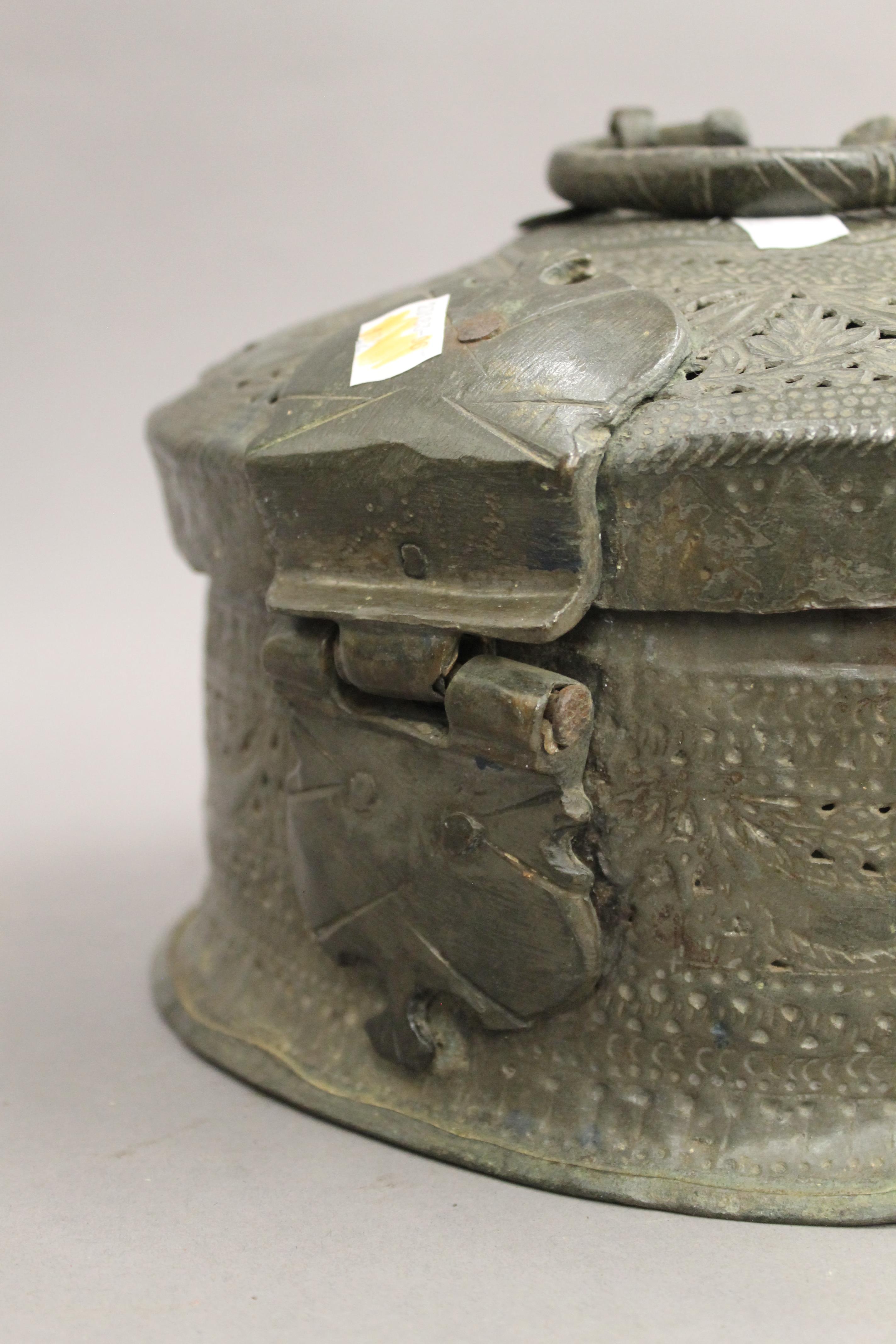 An Indian bronze lidded food box. 28.5 cm diameter. - Image 4 of 5