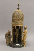 A cold painted bronze model of a tower. 32 cm high.