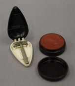 A vintage shaving set, a miniature Razorette razor,