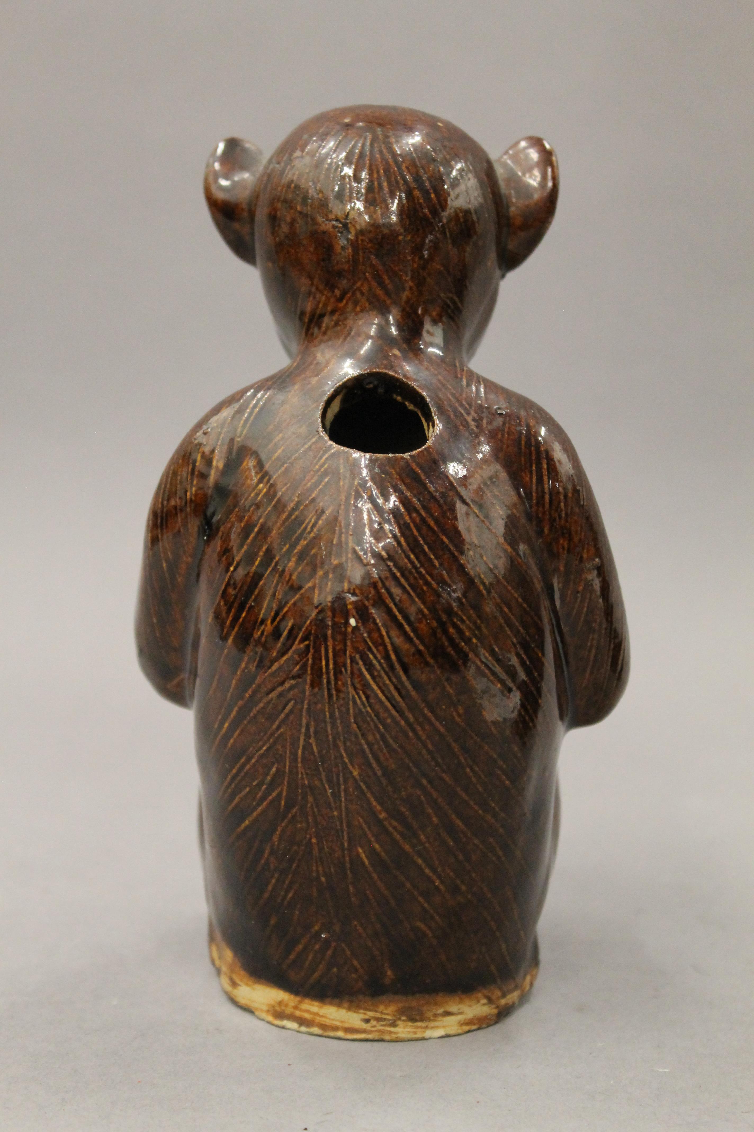 A pair of pottery censers formed as monkeys. Each 15 cm high. - Image 5 of 5