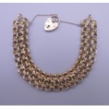 A 9 ct gold woven link bracelet. 21.8 grammes. Approximately 16 cm long.