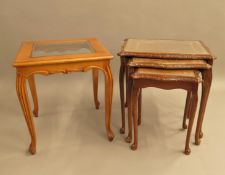 A modern nest of three tables and a glass topped coffee table. The former 57 cm wide.