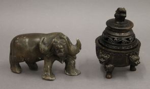 A bronze censer and a soapstone buffalo. The former 13 cm high.