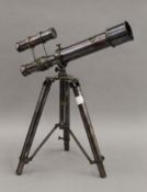 A telescope on stand. 25.5 cm long.