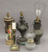 A quantity of various table lamps.