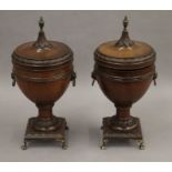 A pair of Adam revival mahogany lidded urns. 32.5 cm high, 15 cm wide.