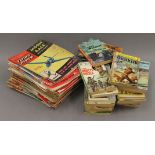 A quantity of vintage Flying Review magazines, Commando books, etc.