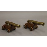 A pair of model desk canons. 14 cm long.