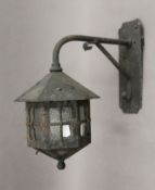 A vintage wrought iron hanging lantern.