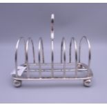 A large silver toast rack. 9.2 troy ounces.