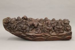 A Chinese bamboo carving. 41 cm long.