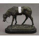 A spelter model of a horse. 20 cm long.