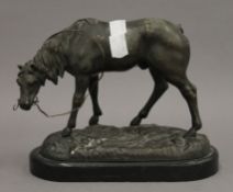 A spelter model of a horse. 20 cm long.