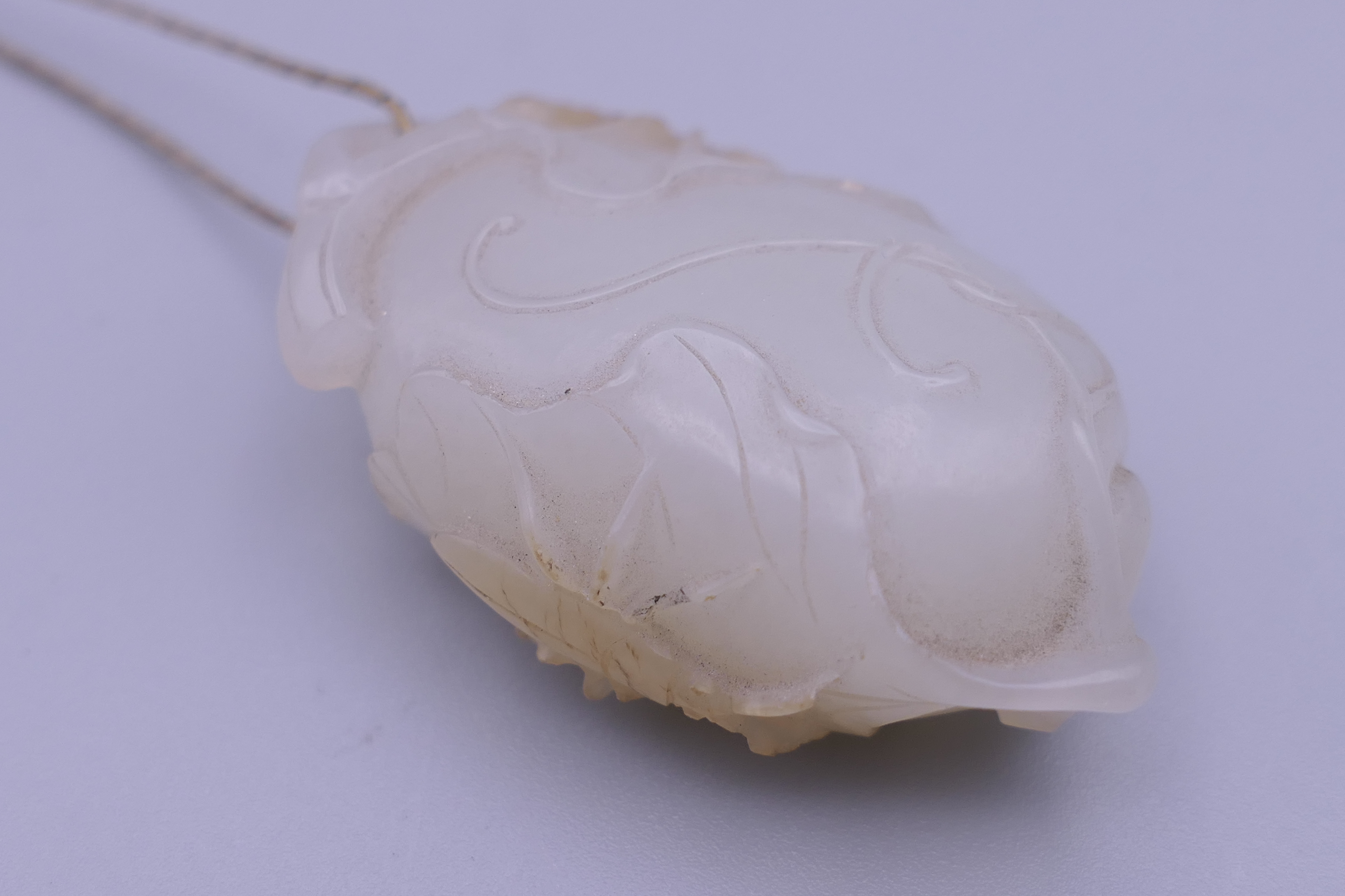 A Chinese mutton fat carved jade pendant, formed as insects on a flowering fruit. 4.5 cm high. - Image 2 of 13