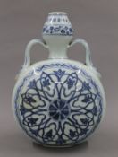 A Chinese porcelain blue and white moon vase.