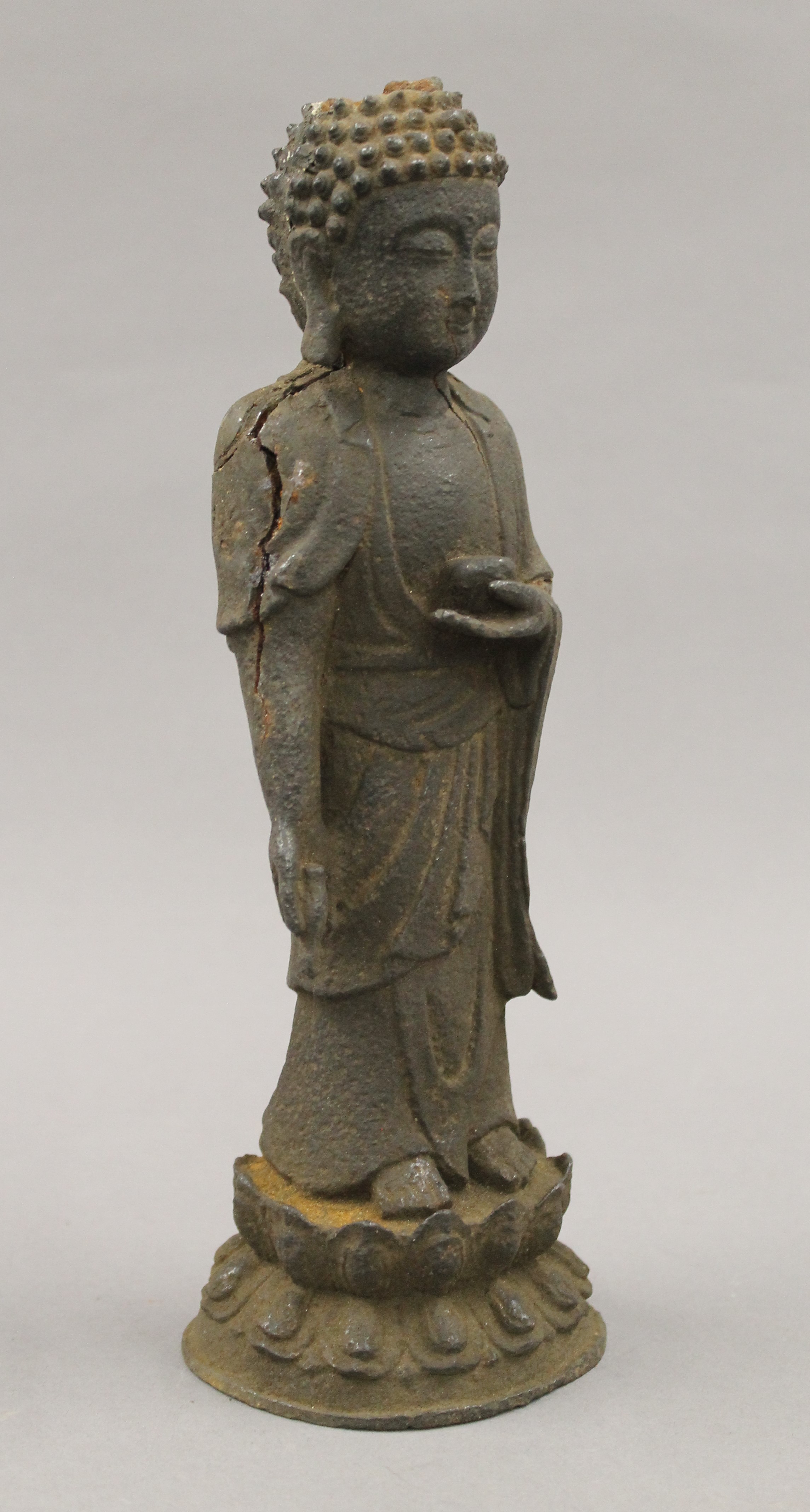 An antique Chinese iron model of buddha. 27 cm high. - Image 3 of 7