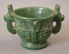 A Chinese archaic style green jade censer. 15 cm wide.