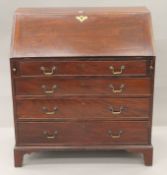 A Georgian mahogany bureau. 96 cm wide.