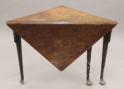 An 18th century mahogany pad foot drop leaf table. 102 cm wide.