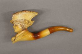 A Victorian cased Meerschaum and amber pipe formed as a lady. 10 cm long overall.