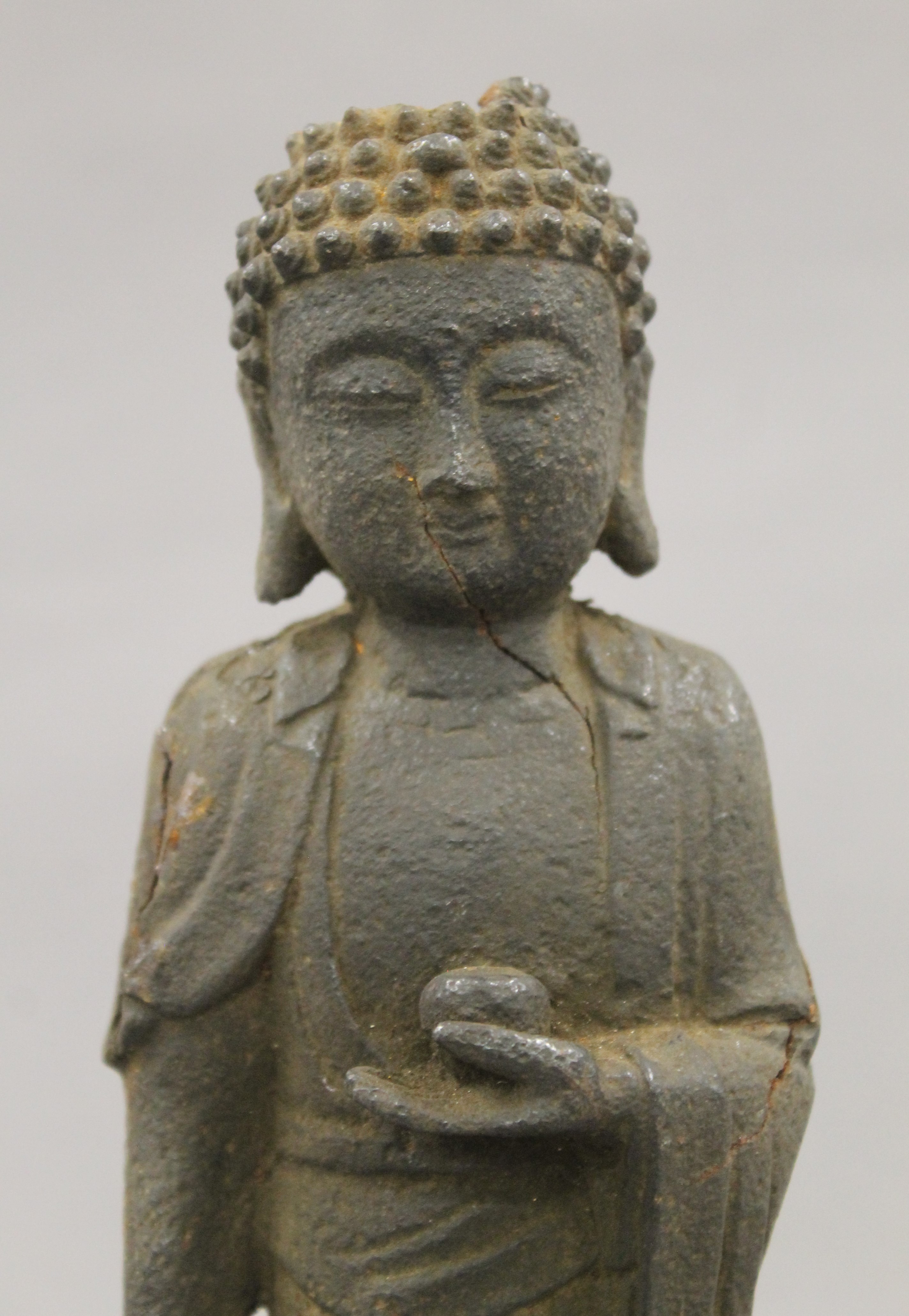 An antique Chinese iron model of buddha. 27 cm high. - Image 2 of 7