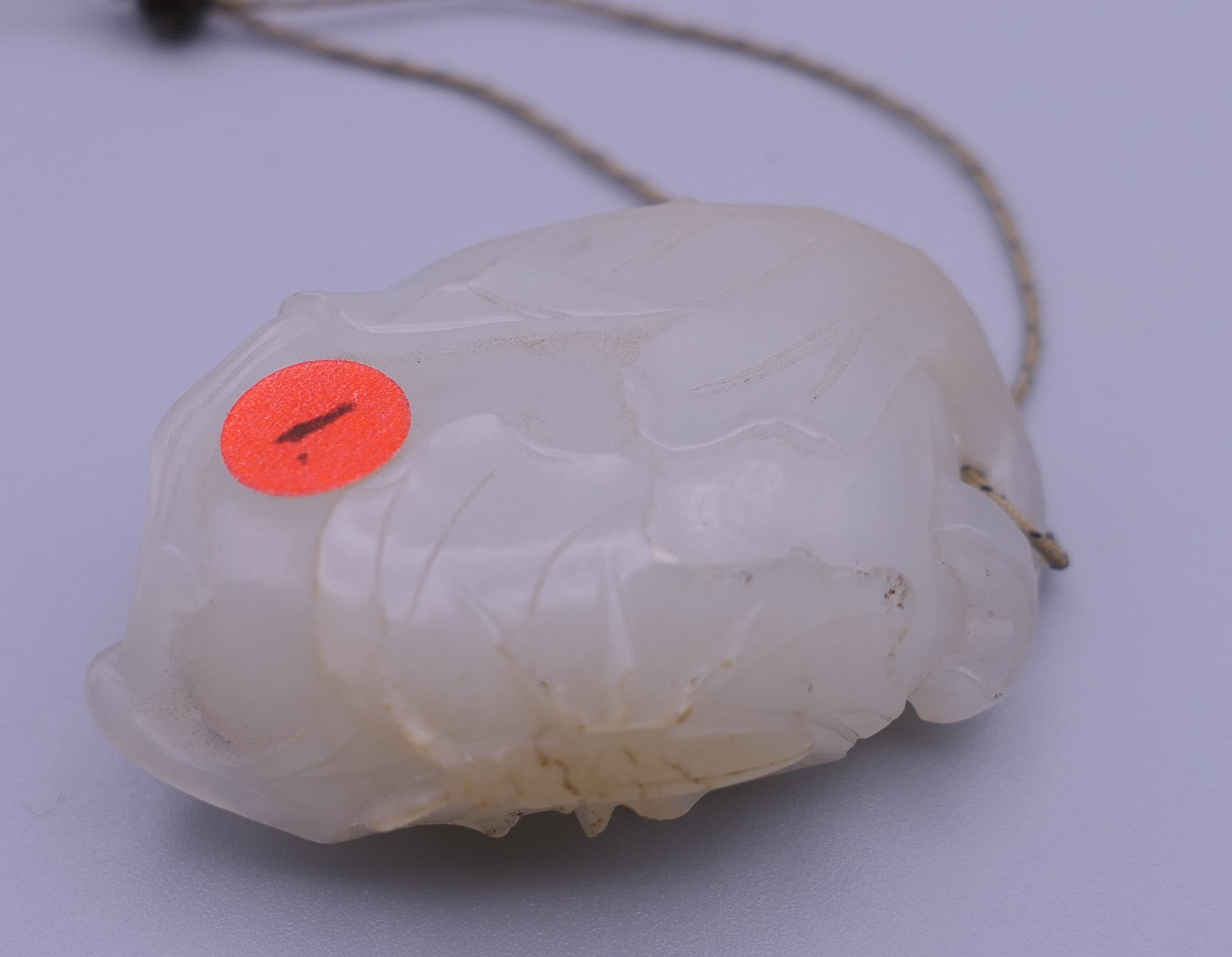 A Chinese mutton fat carved jade pendant, formed as insects on a flowering fruit. 4.5 cm high. - Image 4 of 13