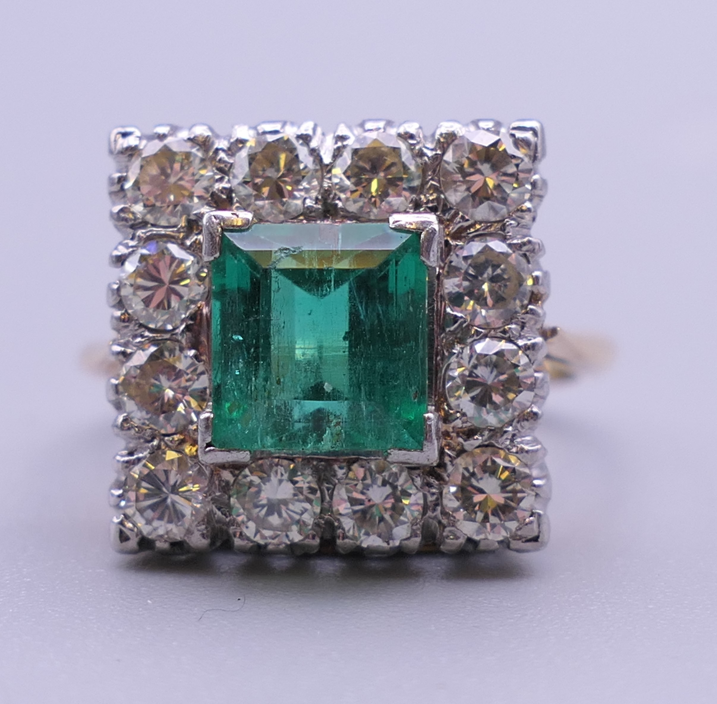 An 18 ct gold and platinum emerald and diamond ring. Ring size H/I (with previous sizing mounts). 1. - Image 7 of 8