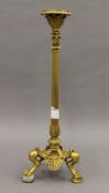 A 19th century ormolu candlestick. 35.5 cm high.