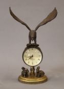 An eagle ball clock. 21 cm high.