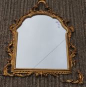 A gilt framed mirror