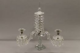 A cut glass candelabra. 47 cm high.