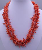 A two strand coral necklace. 42 cm long.