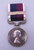 An Elizabeth II RAF Long Service and Good Conduct medal, awarded to L2548954 M AE OP C CURTIS RAF.