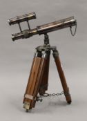 A small telescope on stand. 23 cm long.