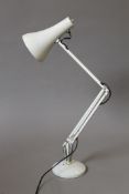 A white angle poise lamp, model number 90.