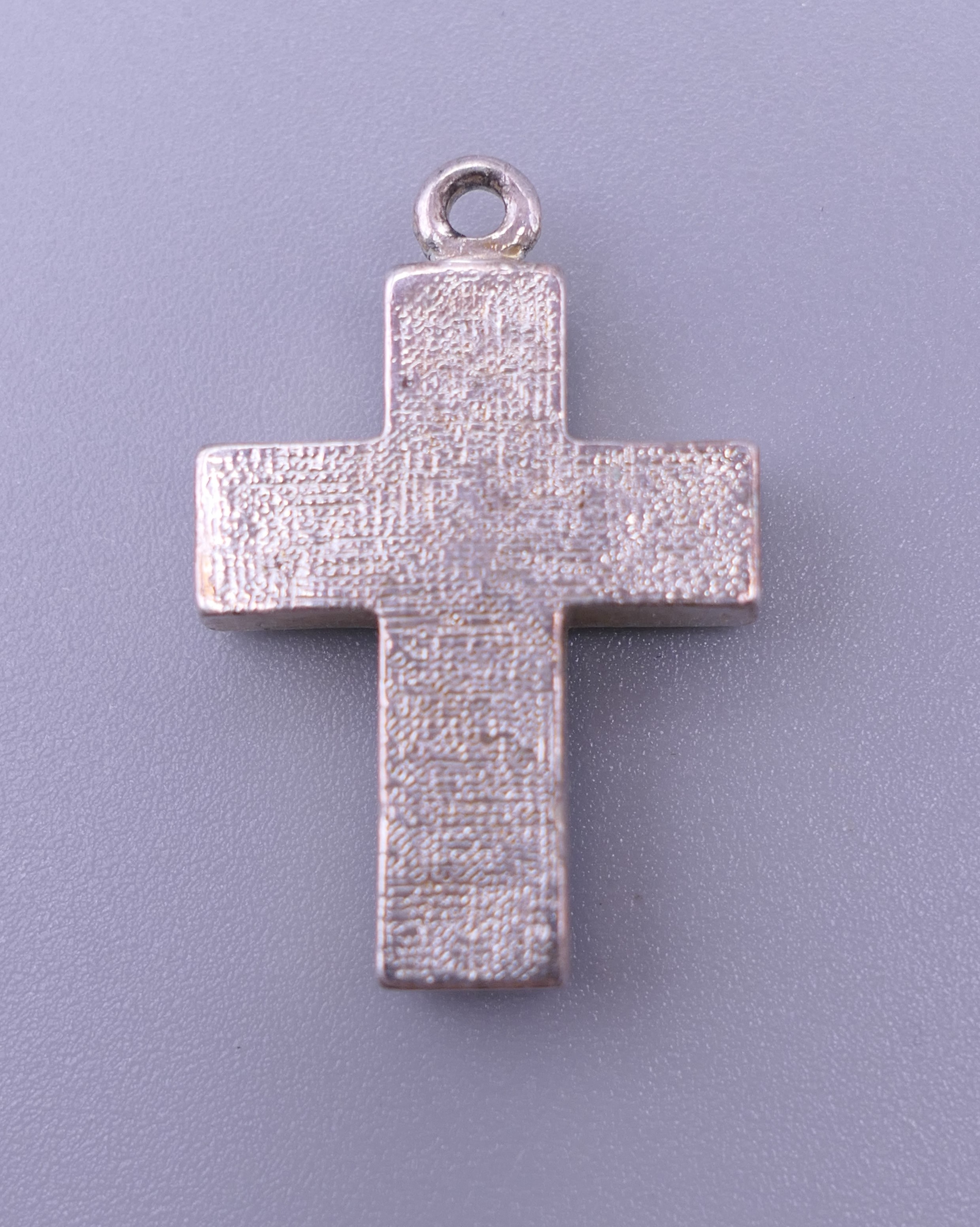 A sterling silver blue stone cross pendant, - Image 7 of 12